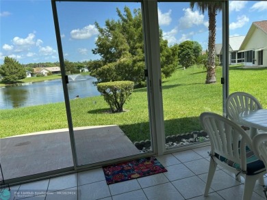 Free standing single family Waterfront home in the gated on Cypress Lakes Golf Course - West Palm Beach in Florida - for sale on GolfHomes.com, golf home, golf lot