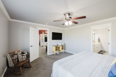 This stunning 4 bed, 2 bath home sits on a  1-acre corner lot on Spring Creek Golf Course in Nevada - for sale on GolfHomes.com, golf home, golf lot