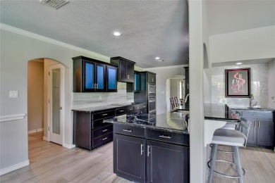 Welcome to 6101 W Choctaw Ct - a stunning, fully remodeled golf on De Cordova Bend Country Club in Texas - for sale on GolfHomes.com, golf home, golf lot