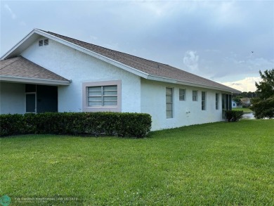 Free standing single family Waterfront home in the gated on Cypress Lakes Golf Course - West Palm Beach in Florida - for sale on GolfHomes.com, golf home, golf lot