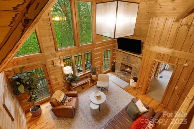 Prepare to fall in love with this beautifully updated mountain on Wolf Laurel Country Club in North Carolina - for sale on GolfHomes.com, golf home, golf lot