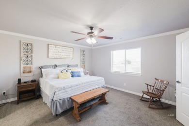 This stunning 4 bed, 2 bath home sits on a  1-acre corner lot on Spring Creek Golf Course in Nevada - for sale on GolfHomes.com, golf home, golf lot