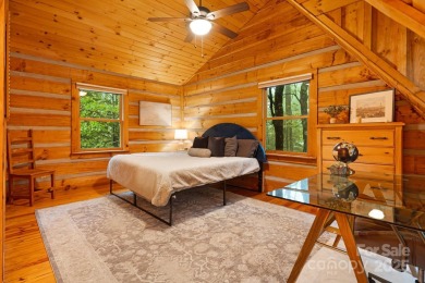 Prepare to fall in love with this beautifully updated mountain on Wolf Laurel Country Club in North Carolina - for sale on GolfHomes.com, golf home, golf lot