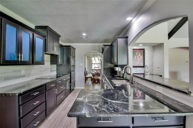 Welcome to 6101 W Choctaw Ct - a stunning, fully remodeled golf on De Cordova Bend Country Club in Texas - for sale on GolfHomes.com, golf home, golf lot