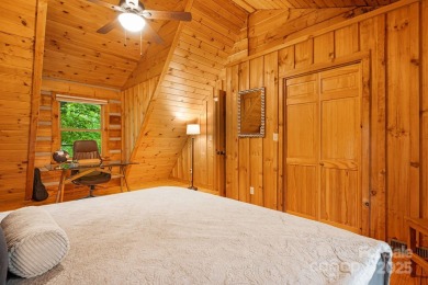 Prepare to fall in love with this beautifully updated mountain on Wolf Laurel Country Club in North Carolina - for sale on GolfHomes.com, golf home, golf lot
