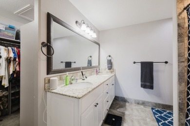This stunning 4 bed, 2 bath home sits on a  1-acre corner lot on Spring Creek Golf Course in Nevada - for sale on GolfHomes.com, golf home, golf lot