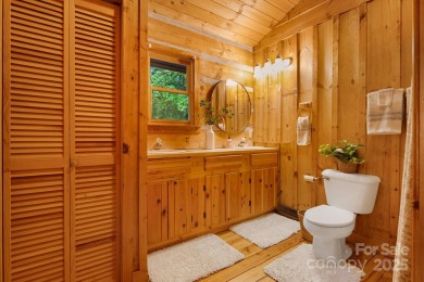 Prepare to fall in love with this beautifully updated mountain on Wolf Laurel Country Club in North Carolina - for sale on GolfHomes.com, golf home, golf lot