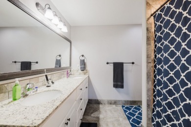 This stunning 4 bed, 2 bath home sits on a  1-acre corner lot on Spring Creek Golf Course in Nevada - for sale on GolfHomes.com, golf home, golf lot