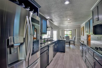 Welcome to 6101 W Choctaw Ct - a stunning, fully remodeled golf on De Cordova Bend Country Club in Texas - for sale on GolfHomes.com, golf home, golf lot