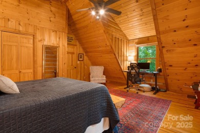 Prepare to fall in love with this beautifully updated mountain on Wolf Laurel Country Club in North Carolina - for sale on GolfHomes.com, golf home, golf lot