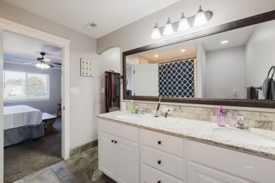 This stunning 4 bed, 2 bath home sits on a  1-acre corner lot on Spring Creek Golf Course in Nevada - for sale on GolfHomes.com, golf home, golf lot