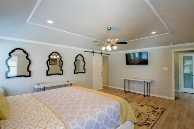 Welcome to 6101 W Choctaw Ct - a stunning, fully remodeled golf on De Cordova Bend Country Club in Texas - for sale on GolfHomes.com, golf home, golf lot