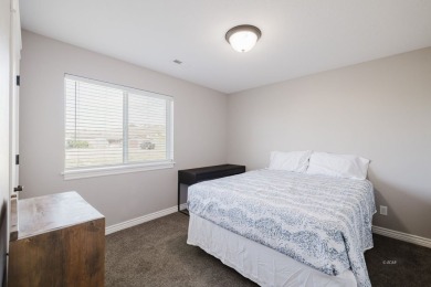 This stunning 4 bed, 2 bath home sits on a  1-acre corner lot on Spring Creek Golf Course in Nevada - for sale on GolfHomes.com, golf home, golf lot