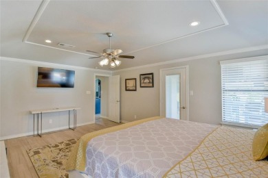 Welcome to 6101 W Choctaw Ct - a stunning, fully remodeled golf on De Cordova Bend Country Club in Texas - for sale on GolfHomes.com, golf home, golf lot