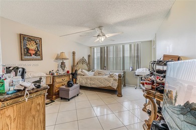 Welcome to Park Place Condos, where you can enjoy expansive open on Pembroke Lakes Golf Club in Florida - for sale on GolfHomes.com, golf home, golf lot
