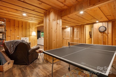 Prepare to fall in love with this beautifully updated mountain on Wolf Laurel Country Club in North Carolina - for sale on GolfHomes.com, golf home, golf lot