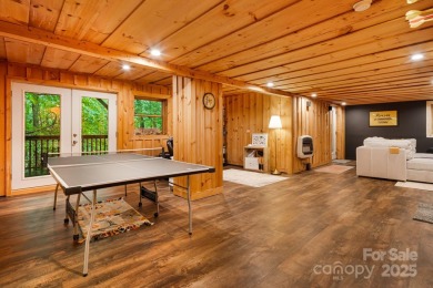 Prepare to fall in love with this beautifully updated mountain on Wolf Laurel Country Club in North Carolina - for sale on GolfHomes.com, golf home, golf lot
