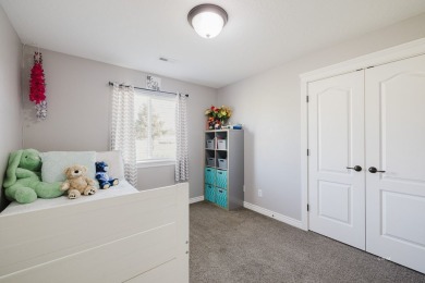 This stunning 4 bed, 2 bath home sits on a  1-acre corner lot on Spring Creek Golf Course in Nevada - for sale on GolfHomes.com, golf home, golf lot