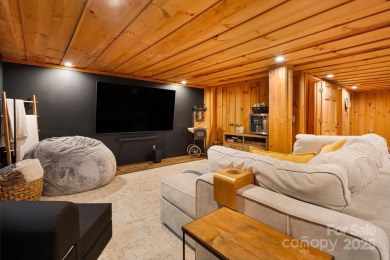 Prepare to fall in love with this beautifully updated mountain on Wolf Laurel Country Club in North Carolina - for sale on GolfHomes.com, golf home, golf lot