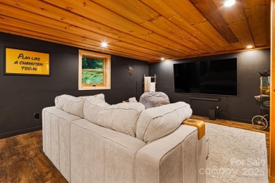 Prepare to fall in love with this beautifully updated mountain on Wolf Laurel Country Club in North Carolina - for sale on GolfHomes.com, golf home, golf lot