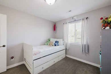 This stunning 4 bed, 2 bath home sits on a  1-acre corner lot on Spring Creek Golf Course in Nevada - for sale on GolfHomes.com, golf home, golf lot