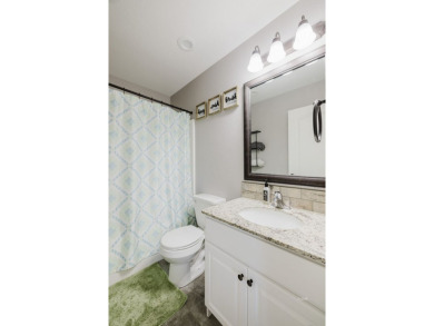 This stunning 4 bed, 2 bath home sits on a  1-acre corner lot on Spring Creek Golf Course in Nevada - for sale on GolfHomes.com, golf home, golf lot