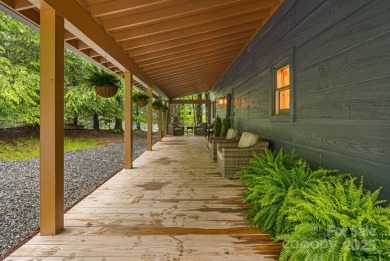 Prepare to fall in love with this beautifully updated mountain on Wolf Laurel Country Club in North Carolina - for sale on GolfHomes.com, golf home, golf lot