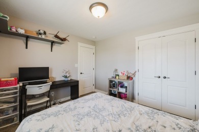 This stunning 4 bed, 2 bath home sits on a  1-acre corner lot on Spring Creek Golf Course in Nevada - for sale on GolfHomes.com, golf home, golf lot