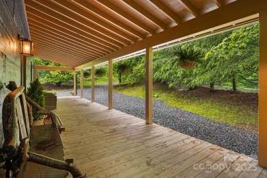 Prepare to fall in love with this beautifully updated mountain on Wolf Laurel Country Club in North Carolina - for sale on GolfHomes.com, golf home, golf lot