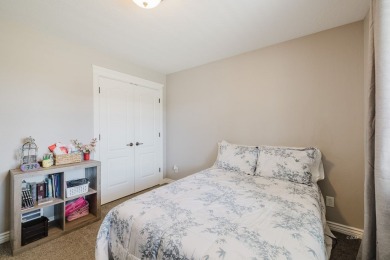 This stunning 4 bed, 2 bath home sits on a  1-acre corner lot on Spring Creek Golf Course in Nevada - for sale on GolfHomes.com, golf home, golf lot
