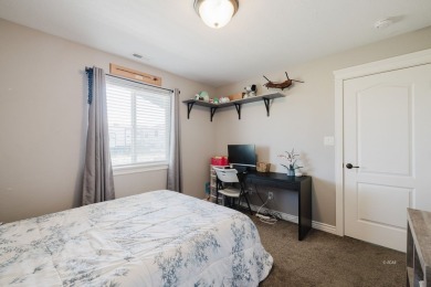 This stunning 4 bed, 2 bath home sits on a  1-acre corner lot on Spring Creek Golf Course in Nevada - for sale on GolfHomes.com, golf home, golf lot