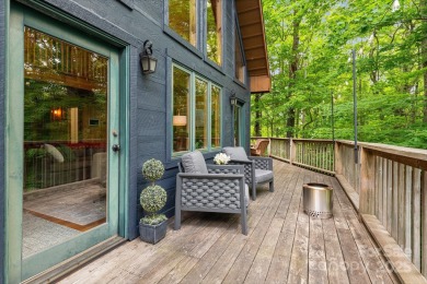 Prepare to fall in love with this beautifully updated mountain on Wolf Laurel Country Club in North Carolina - for sale on GolfHomes.com, golf home, golf lot