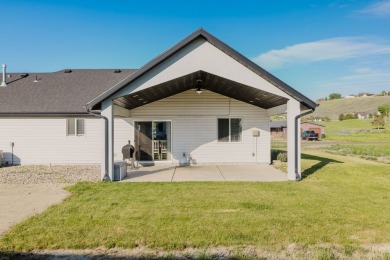 This stunning 4 bed, 2 bath home sits on a  1-acre corner lot on Spring Creek Golf Course in Nevada - for sale on GolfHomes.com, golf home, golf lot