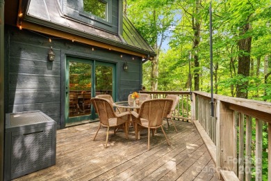 Prepare to fall in love with this beautifully updated mountain on Wolf Laurel Country Club in North Carolina - for sale on GolfHomes.com, golf home, golf lot