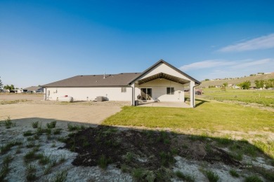 This stunning 4 bed, 2 bath home sits on a  1-acre corner lot on Spring Creek Golf Course in Nevada - for sale on GolfHomes.com, golf home, golf lot