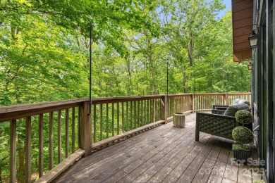 Prepare to fall in love with this beautifully updated mountain on Wolf Laurel Country Club in North Carolina - for sale on GolfHomes.com, golf home, golf lot