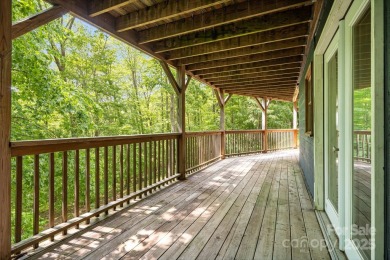Prepare to fall in love with this beautifully updated mountain on Wolf Laurel Country Club in North Carolina - for sale on GolfHomes.com, golf home, golf lot