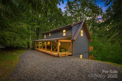 Prepare to fall in love with this beautifully updated mountain on Wolf Laurel Country Club in North Carolina - for sale on GolfHomes.com, golf home, golf lot