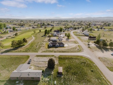 This stunning 4 bed, 2 bath home sits on a  1-acre corner lot on Spring Creek Golf Course in Nevada - for sale on GolfHomes.com, golf home, golf lot