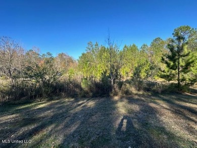 This picturesque corner lot is situated in the serene on Shadow Ridge Golf Club in Mississippi - for sale on GolfHomes.com, golf home, golf lot