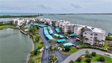 Gorgeous condo at Hutchinson Island with private view of pond on Ocean Club At the Hutchinson Island Beach Resort and Marina in Florida - for sale on GolfHomes.com, golf home, golf lot