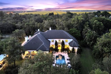 A modern French Chateau in Parkland's most exclusive enclave on Parkland Golf Club in Florida - for sale on GolfHomes.com, golf home, golf lot