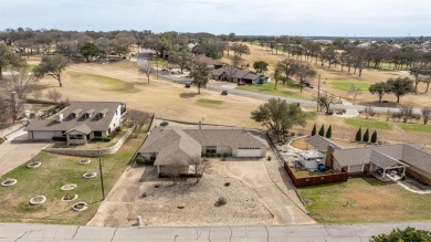 Experience resort-style living in the highly sought-after, gated on De Cordova Bend Country Club in Texas - for sale on GolfHomes.com, golf home, golf lot