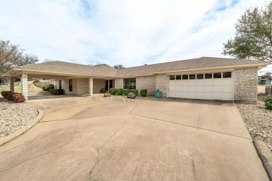 Experience resort-style living in the highly sought-after, gated on De Cordova Bend Country Club in Texas - for sale on GolfHomes.com, golf home, golf lot