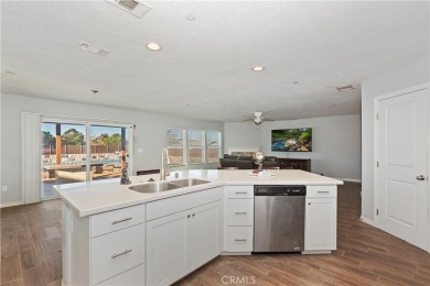 This stunning home offers the perfect blend of elegance and on Hesperia Golf and Country Club in California - for sale on GolfHomes.com, golf home, golf lot