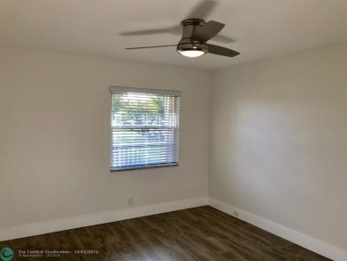 THIS UNIT IS RENTED TO A STABLE TENANT UNTIL SEPTEMBER 2025 FOR on Flamingo Lakes Country Club in Florida - for sale on GolfHomes.com, golf home, golf lot