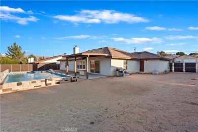 This stunning home offers the perfect blend of elegance and on Hesperia Golf and Country Club in California - for sale on GolfHomes.com, golf home, golf lot