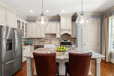 Welcome to an estate home that combines sophisticated design on The Governors Towne Club in Georgia - for sale on GolfHomes.com, golf home, golf lot