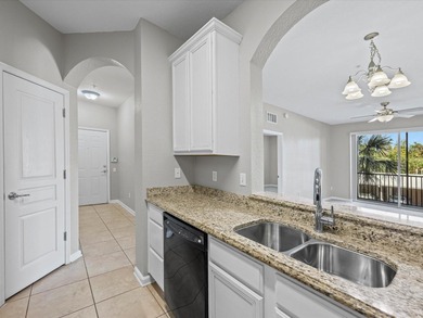 Welcome to this beautifully maintained condo in the gated on ChampionsGate Golf Resort in Florida - for sale on GolfHomes.com, golf home, golf lot