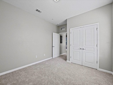 Welcome to this beautifully maintained condo in the gated on ChampionsGate Golf Resort in Florida - for sale on GolfHomes.com, golf home, golf lot